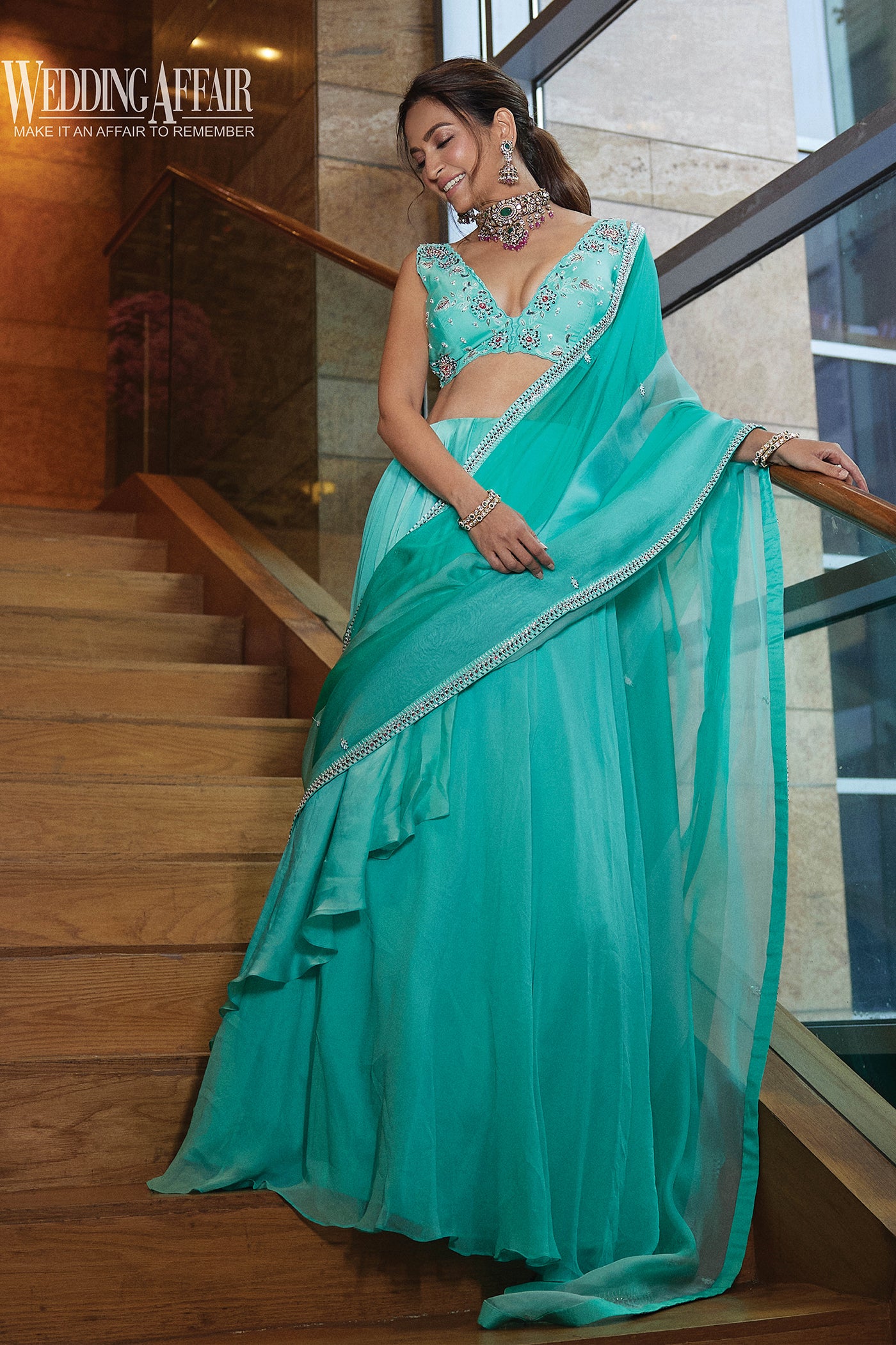 Kriti Kharbanda in Aqua green embroidered lehenga saree set