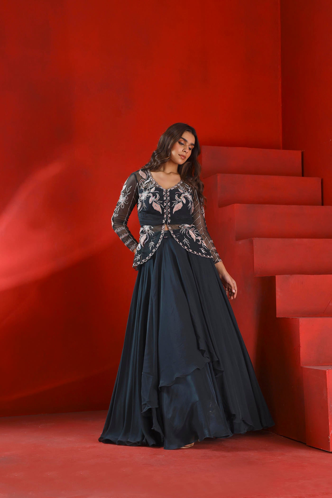 Midnight green embroidered jacket and layered lehenga set