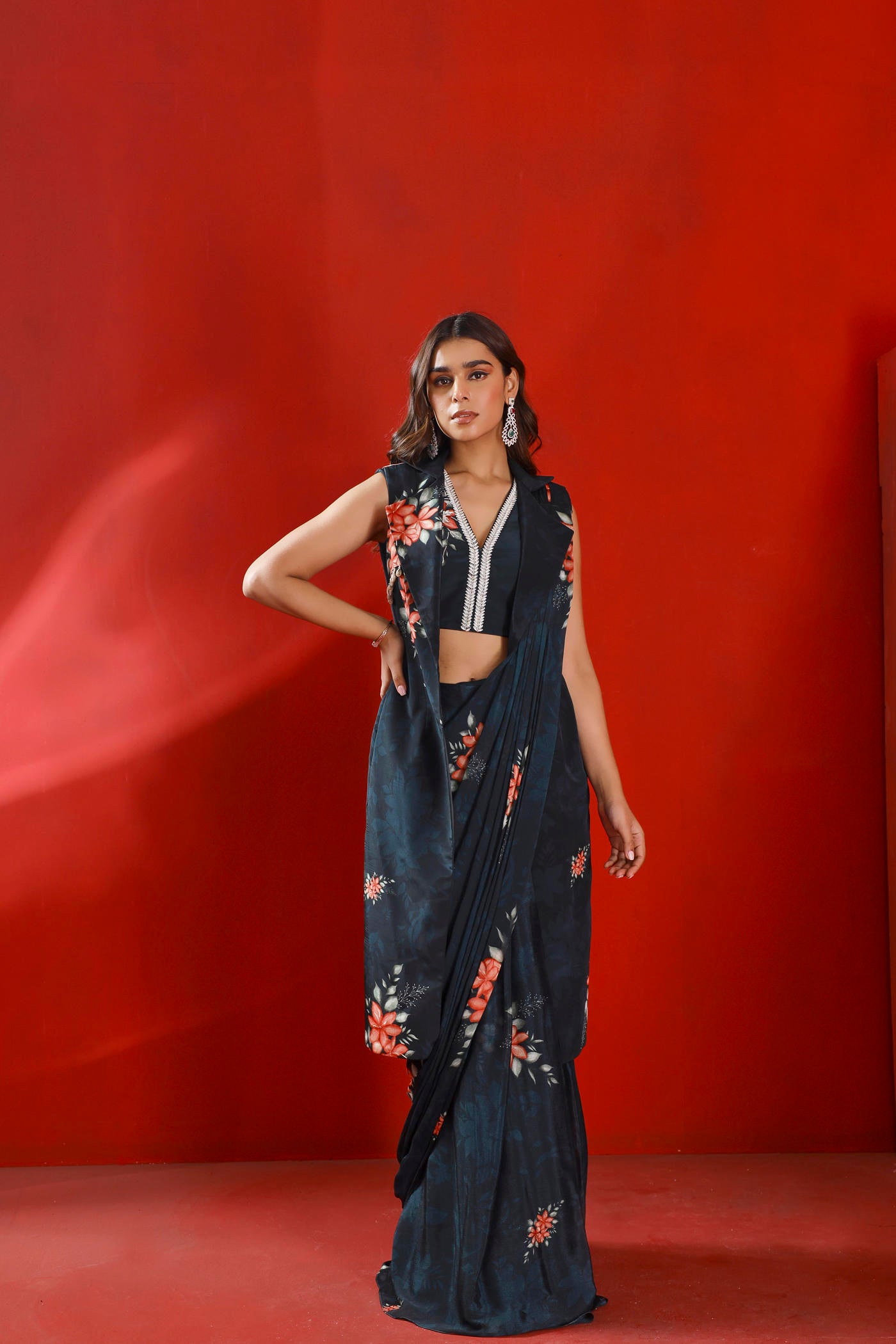 Midnight green sleeveless trench coat with belt