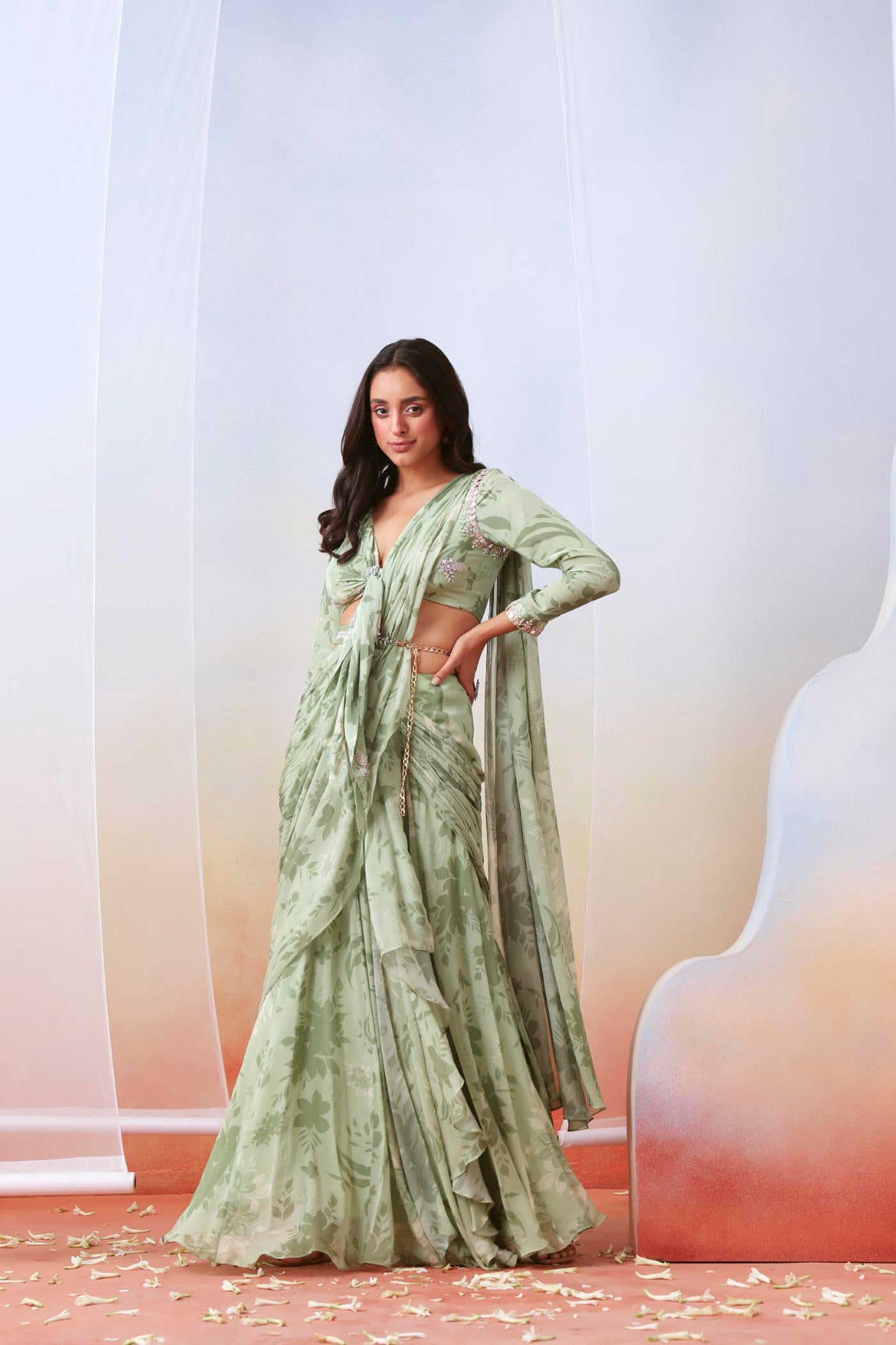 Sage green printed and embroidered pre drape saree set
