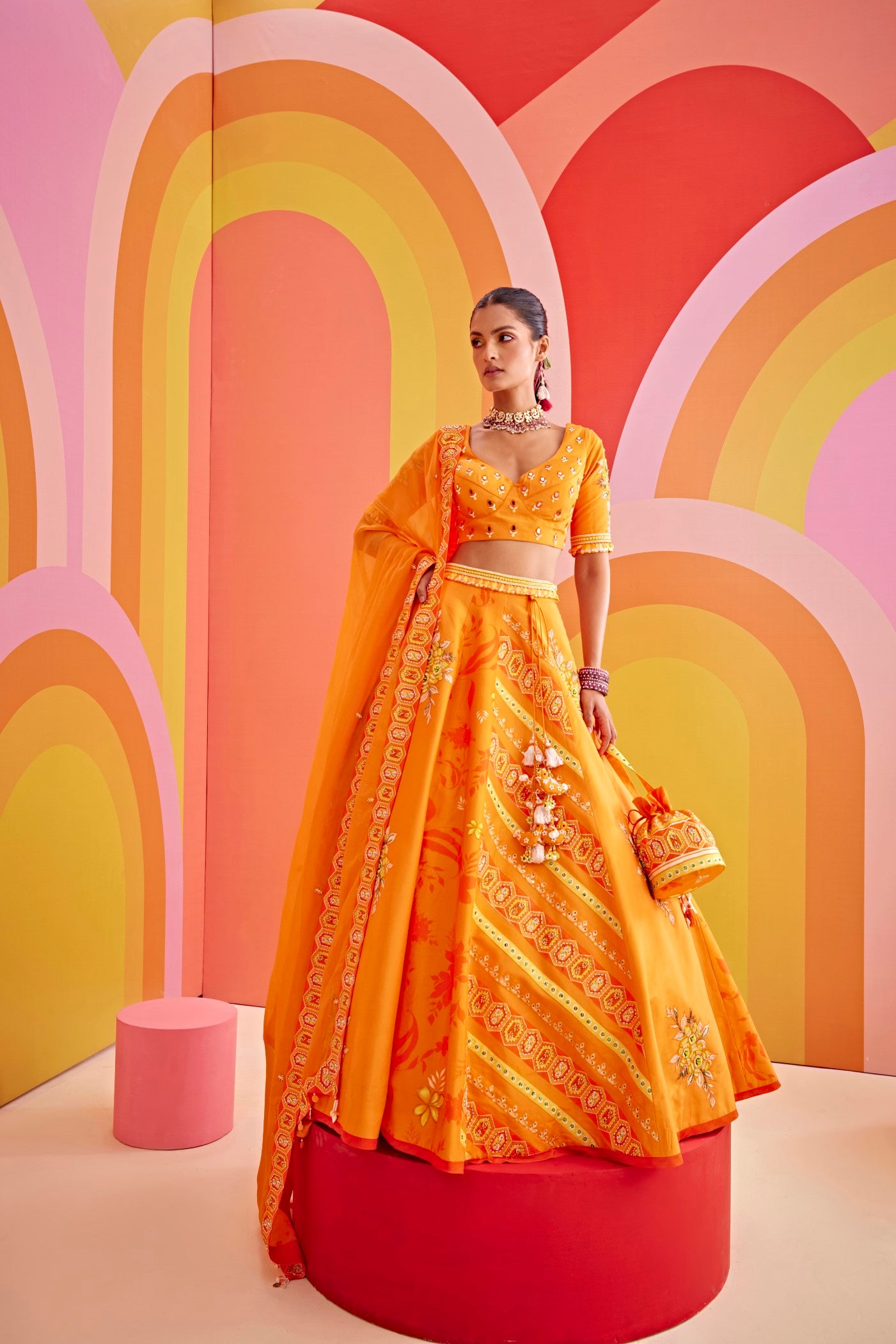 Tangerine orange printed and embroidered silk lehenga set