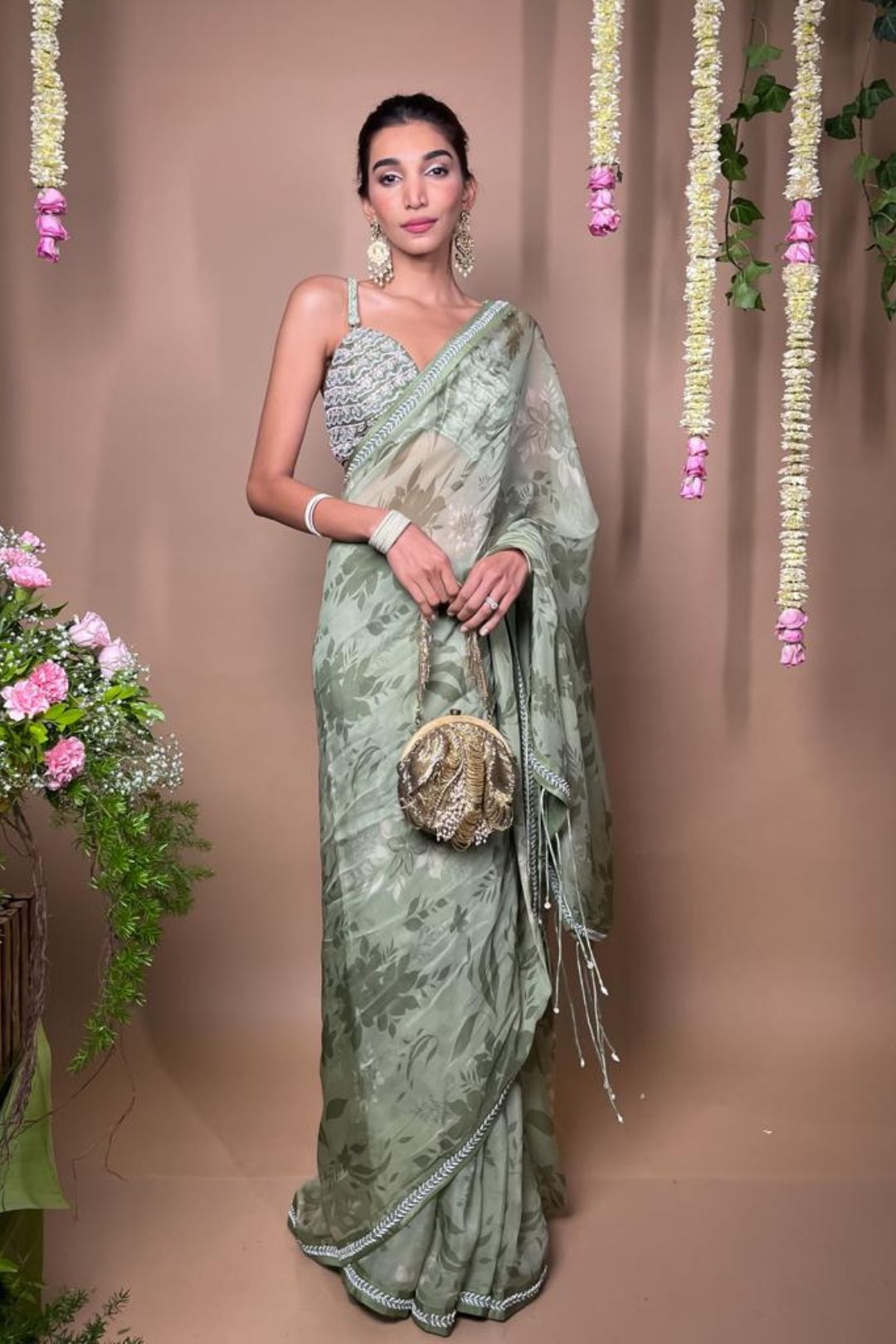 Juhi Godambe in Sage green printed embroidered saree set