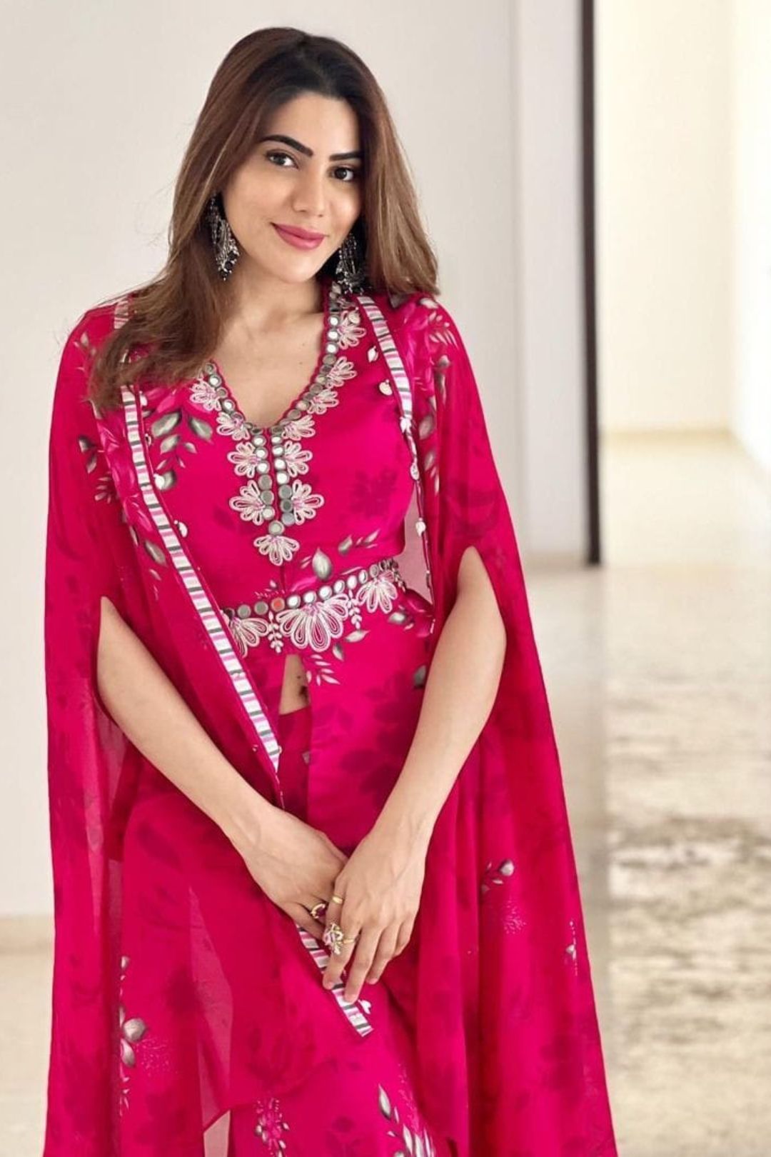 Nikki Tamboli in Pink printed and embroidered sharara set with cape