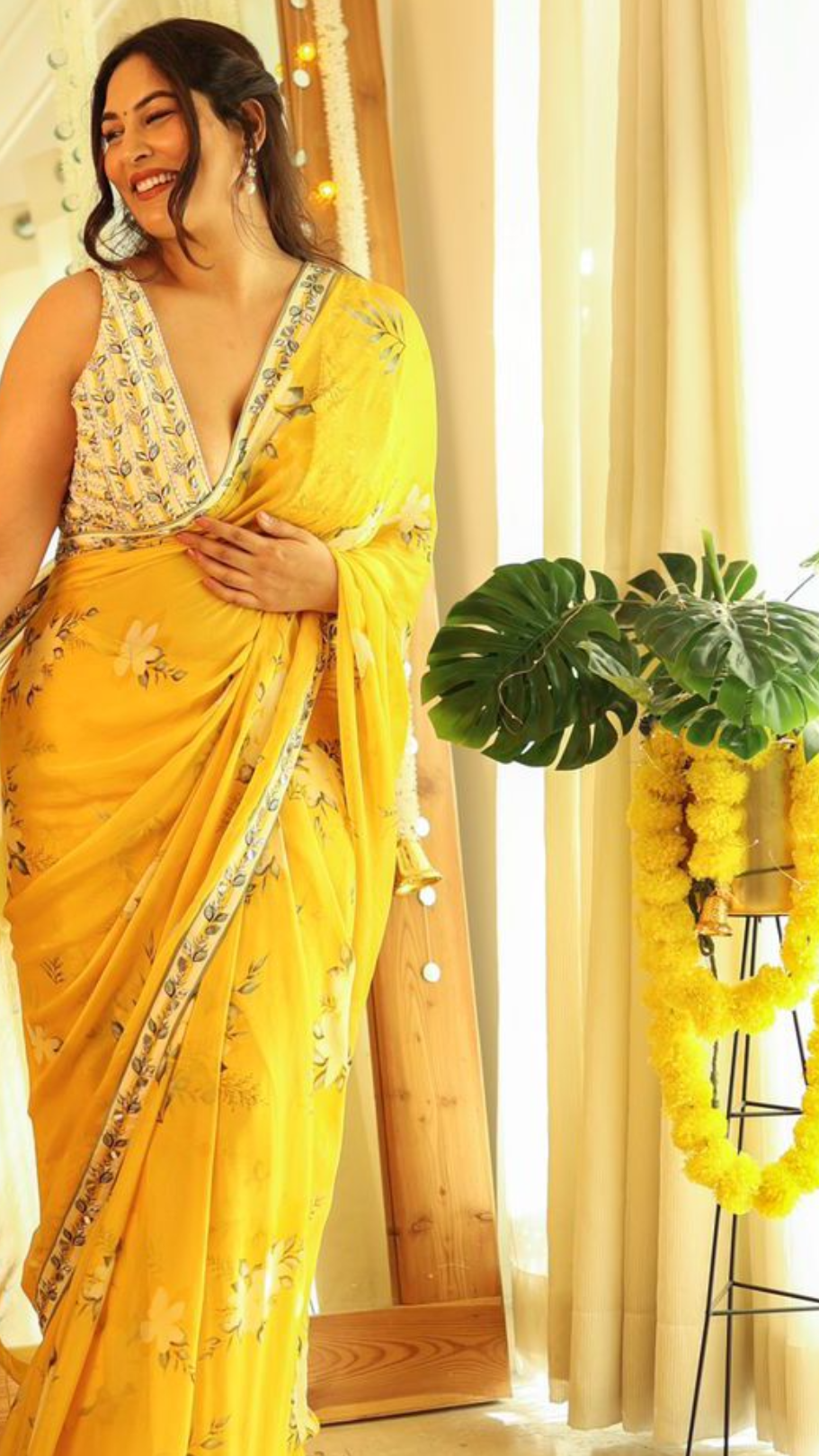 Sakshi Sindwani in Yellow printed embroidered saree set